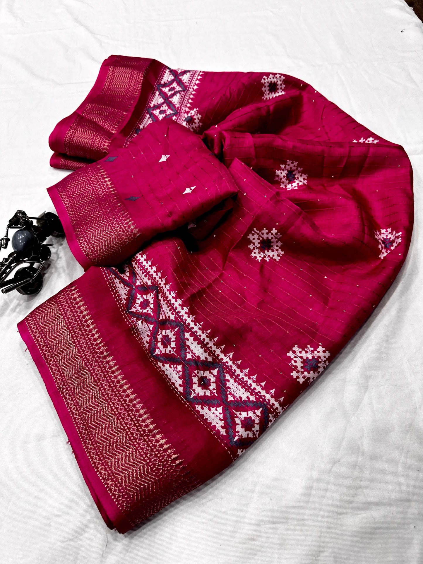 Beautiful Benny crape sikvach saree with all over doll design along with scallop maggam